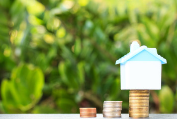 House on a pile of money