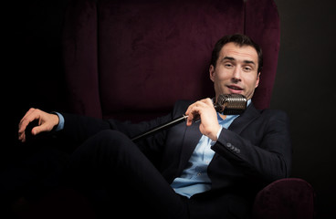 Radio presenter with a microphone