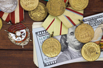 Collection of rare soviet military  awards  and money on vintage background.