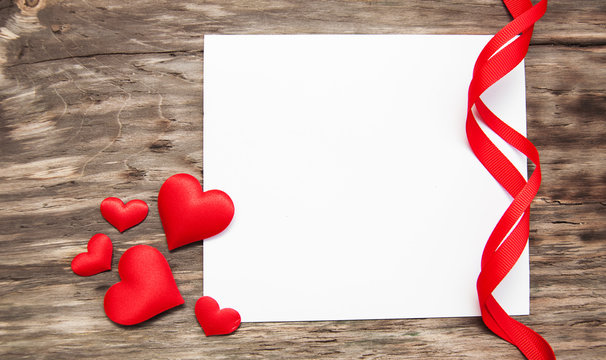 Greeting card with red hearts