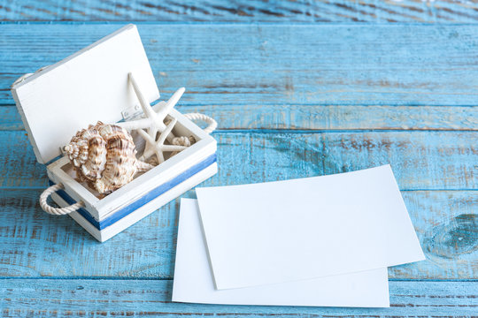 Decorative marine items on wooden background.