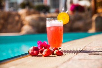 summer cocktail by pool. Delicious beverages