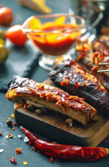 Delicious barbecued ribs seasoned with a spicy basting sauce and
