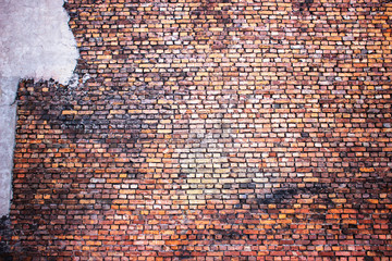 red brick wall, urban exterior, ancient weathered surface