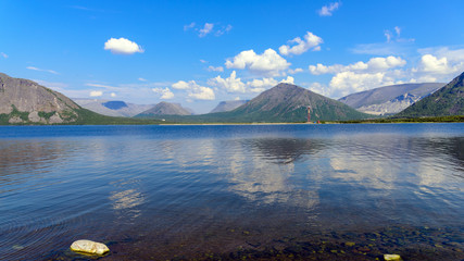 Landscape Big Vudyavr Lake in the Hibiny mountains. Blue sky and