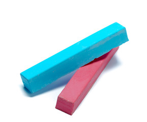 chalks in a variety of colors arranged on a white background
