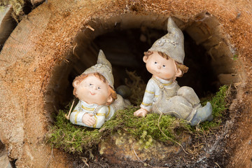 Little elves in a hollow log