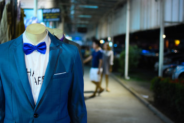 Suits show with puppets in store