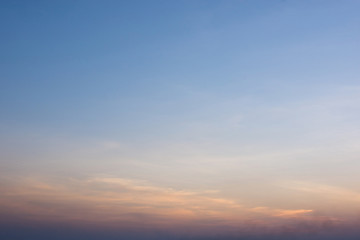 The sky in orange and blue shades, nature background.