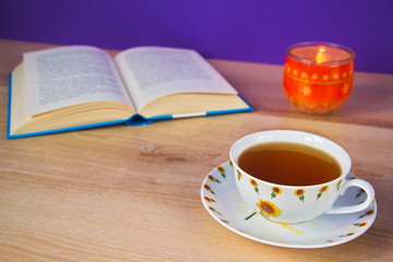 Cup of green tea while reading the book