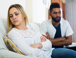 Offended black guy having bad fight with girlfriend and shouting