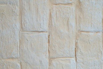 texture of yellow painted brick wall
