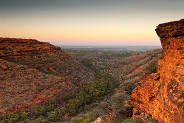 Pre-dawn light illuminates the cliffs of King's Canyon, Australia