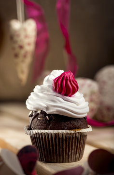 Cupcake with white and pink cream