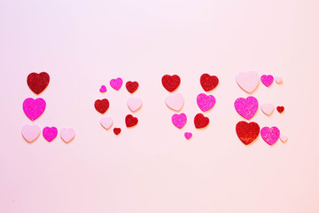 Inscription love in heart on the Valentines Day.