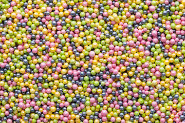 Multicoloured sweet sugar balls. Small ball pattern.