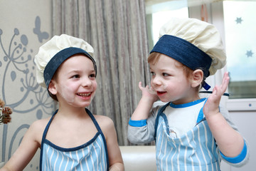 Boys playing in kitchen