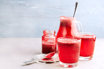 Detox lemonade in glasses with berries