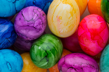 Easter eggs painted in colors on a white background.