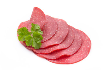 Salami smoked sausage one slice isolated on white background cut