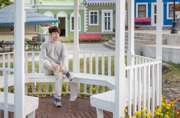 Man Sit Inside Pavilion