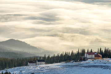 Fototapeta premium misty mountains on ski resort