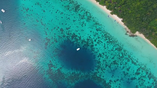 Top view aerial video of beauty nature landscape with beach, corals and sea on Koh Rok island, Thailand, 4k
