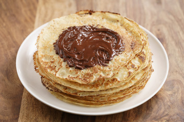 premium dark chocolate on freshly made blinis or crepes, simple sweet food