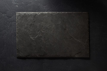 stone and slate on black