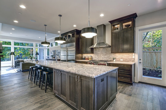 Modern Kitchen With Brown Kitchen Cabinets