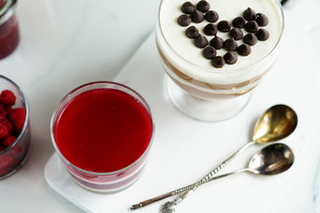 fruit jelly and chocolate in a glass j on a white background 