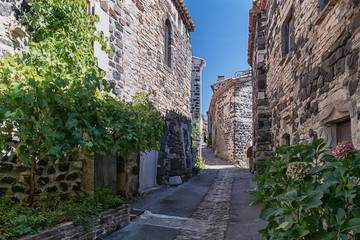 Fototapeta na wymiar The narrow street in the picturesque village of Mirabel.in the Ardeche department in France.