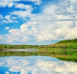 Lake River and spring green hills.