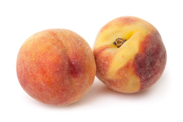 Two peaches isolated on white background with clipping path