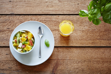 healthy fit breakfast with fruit salad and orange juice