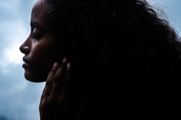 Gorgeous sensual young woman with her eyes closed