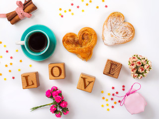 Inscription love on the dice in the decoration Valentine's Day w