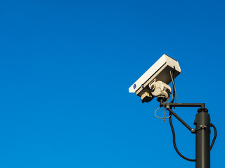 CCTV on pole with blue sky background