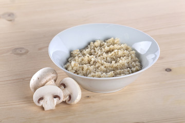 Risotto bowl on wooden table