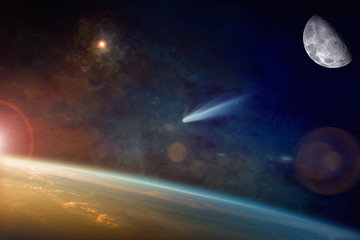 Obraz na płótnie Canvas Bright comet approaching to planet Earth in space