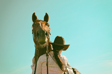 Vintage equestrian background with horse and cowgirl.  Western and rustic graphic resource appeal.