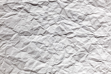 Crumpled white page of paper texture