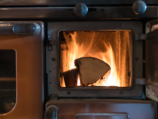 Burning Firewood in oven - 135960894