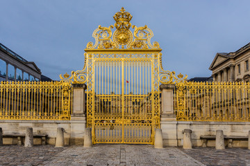 Golden Main Gates of the Versailles Palace. Paris, France.