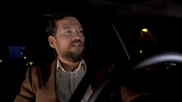 Man driving mad with car