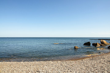 Amazing view of clear sea landscape with blue sky as a background. Calm and beautiful sea like a...