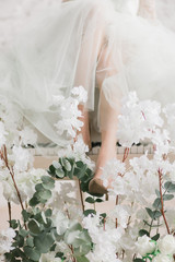 Detail of bridal legs with shoes