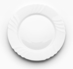 White plate on white background. Top view
