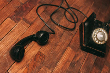telephone handset on the floor, retrophone