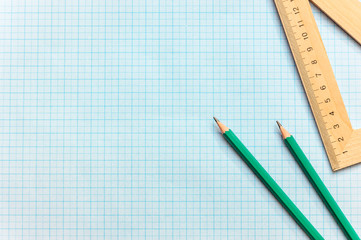 Pencils with ruller on the graph paper.